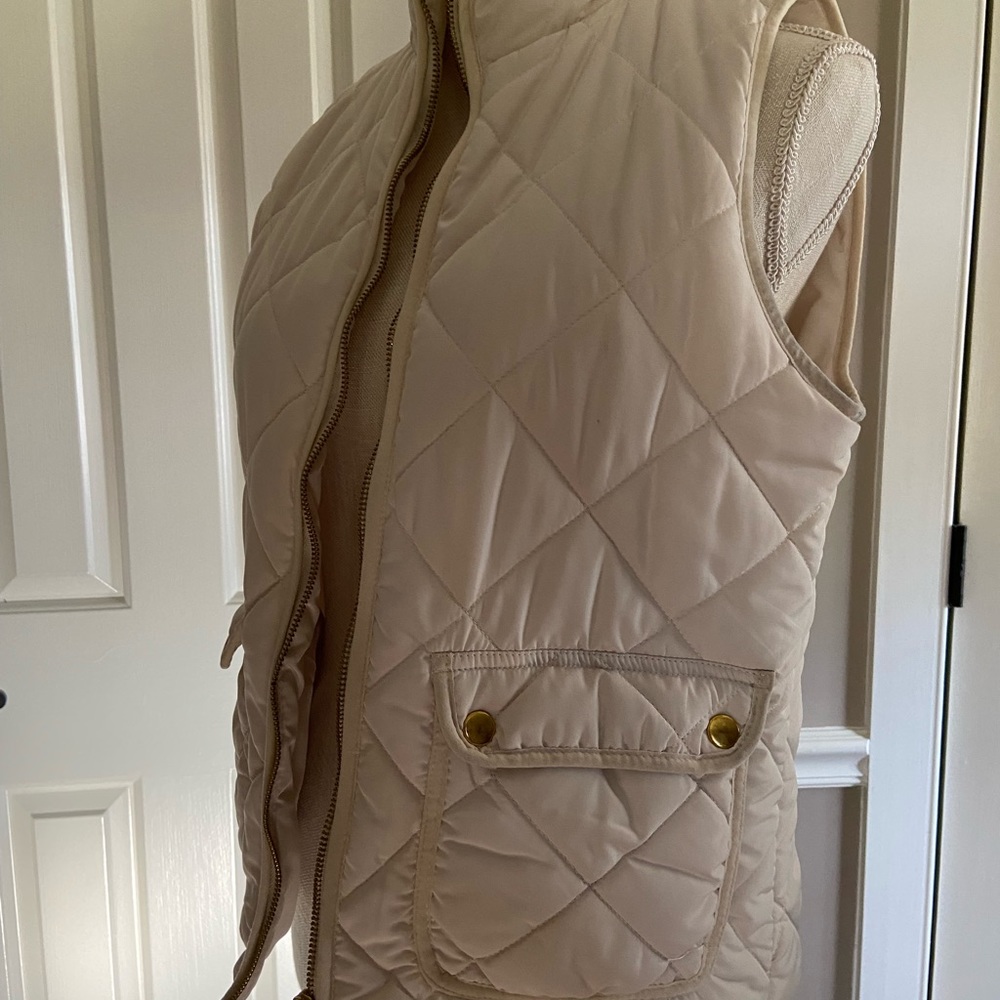 Cream white vest with gold accent
